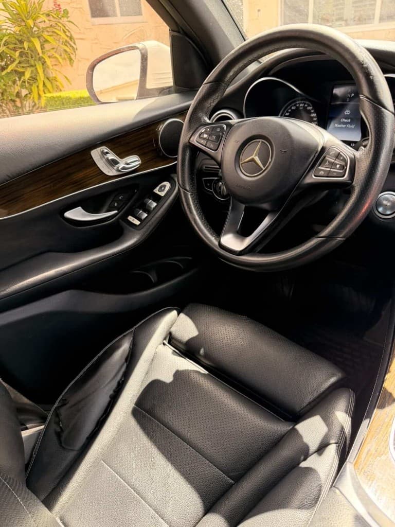 Driver side interior with steering wheel and door panel
